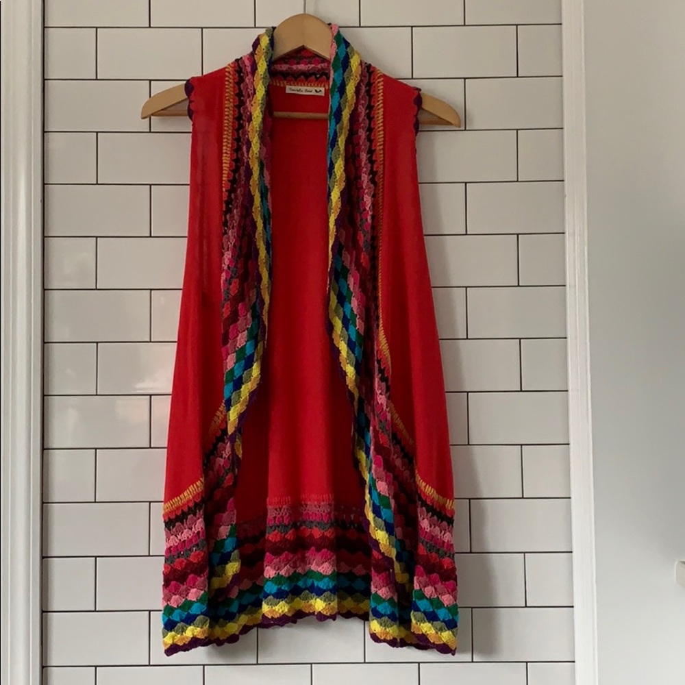 Funky knitted sleeveless cardigan